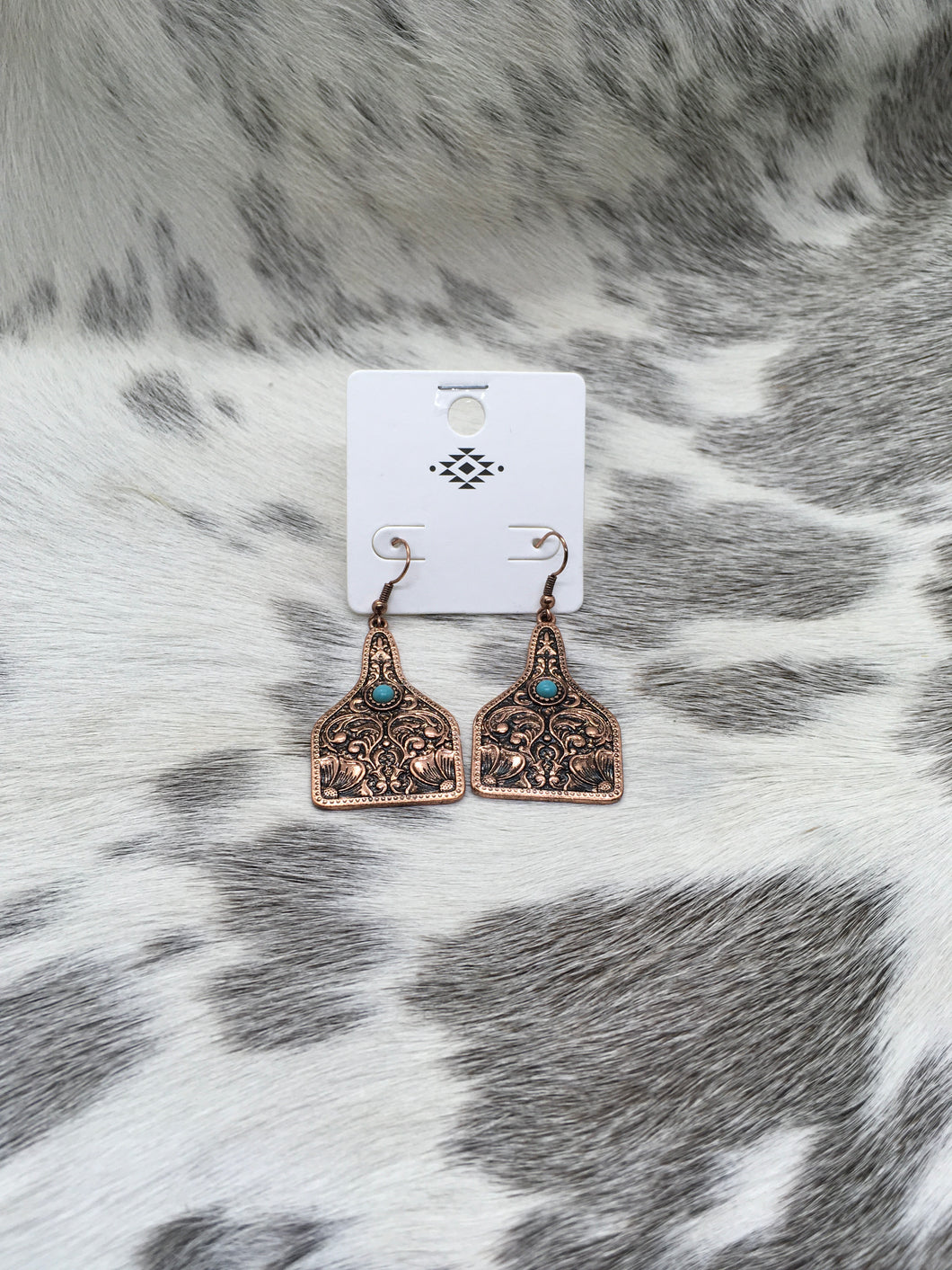 Copper/ turquoise cowtag